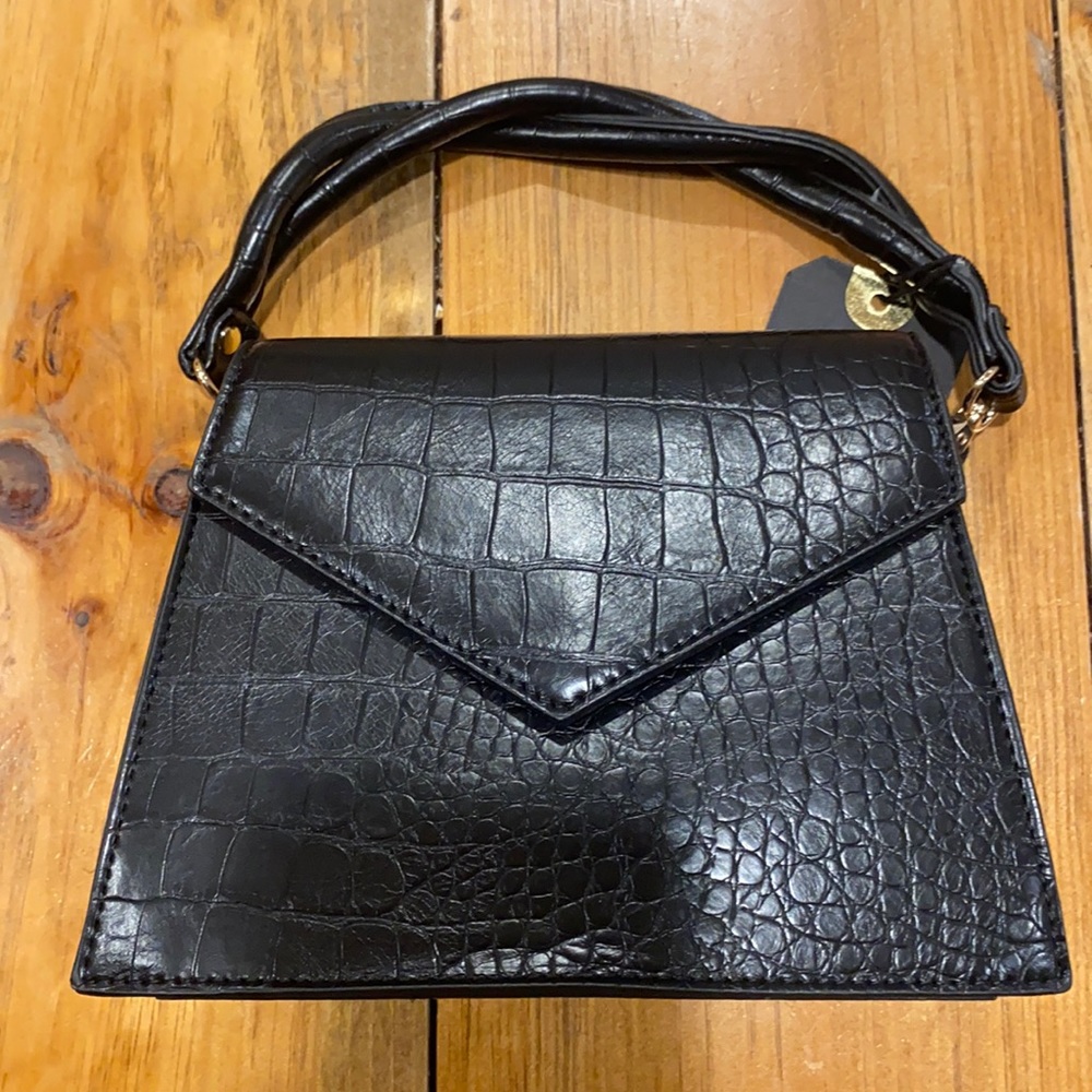Small black snack skin purse and braided handle